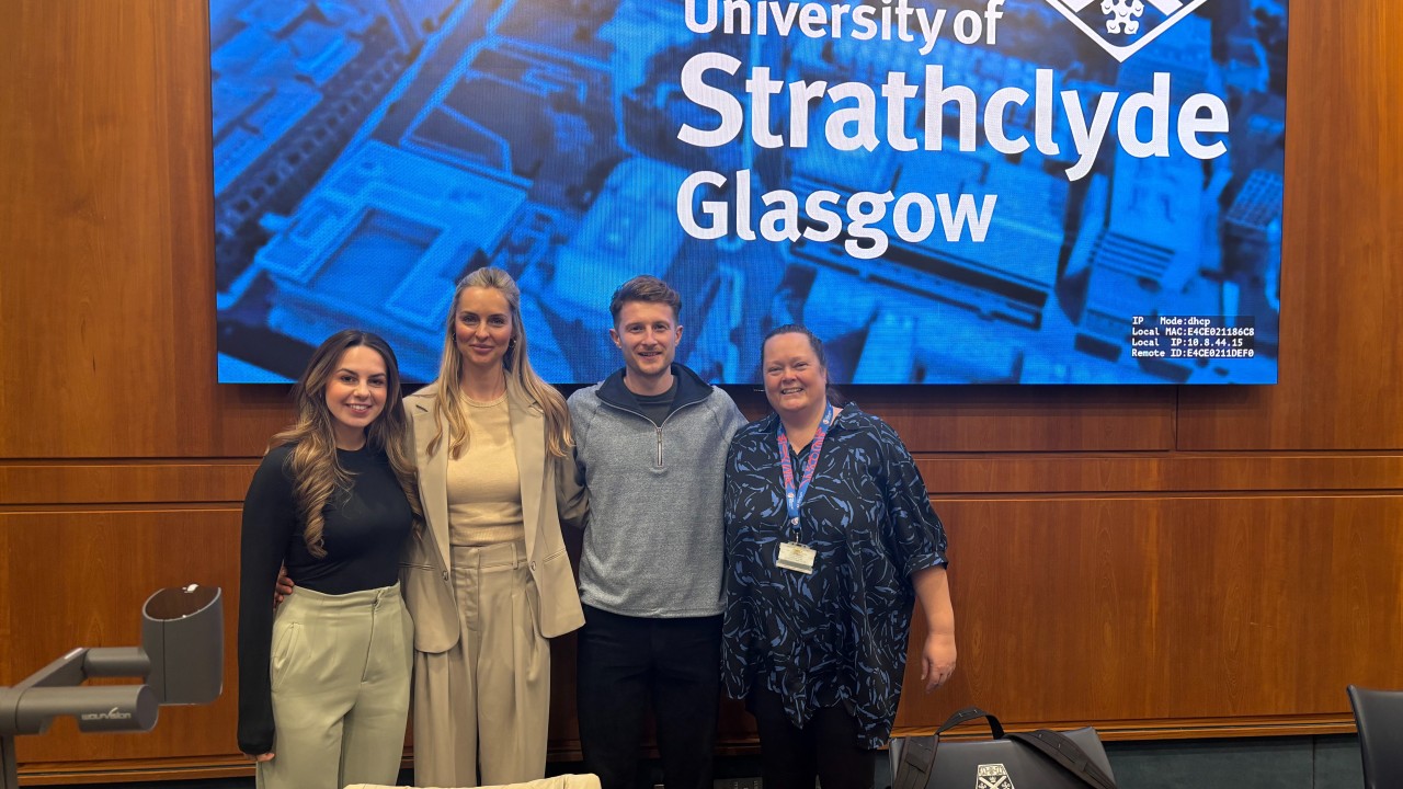 University of Glasgow Students and Lecturer