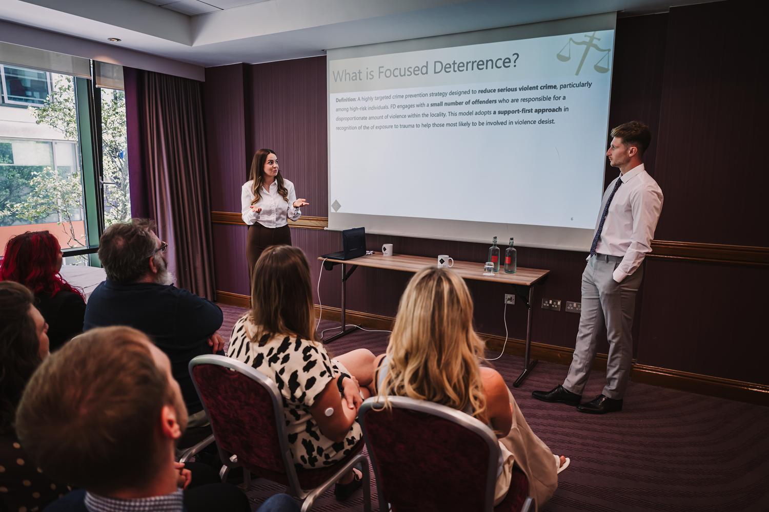 Black Box Research & Consultancy facilitators delivering a session on focused deterrence strategies.
