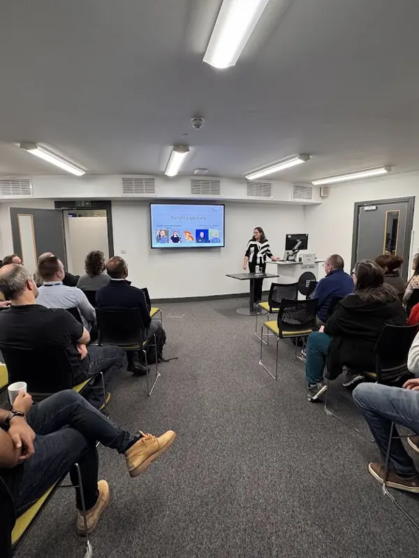 Speaker Frances Brown presenting her talk to audience at DiNG meetup.