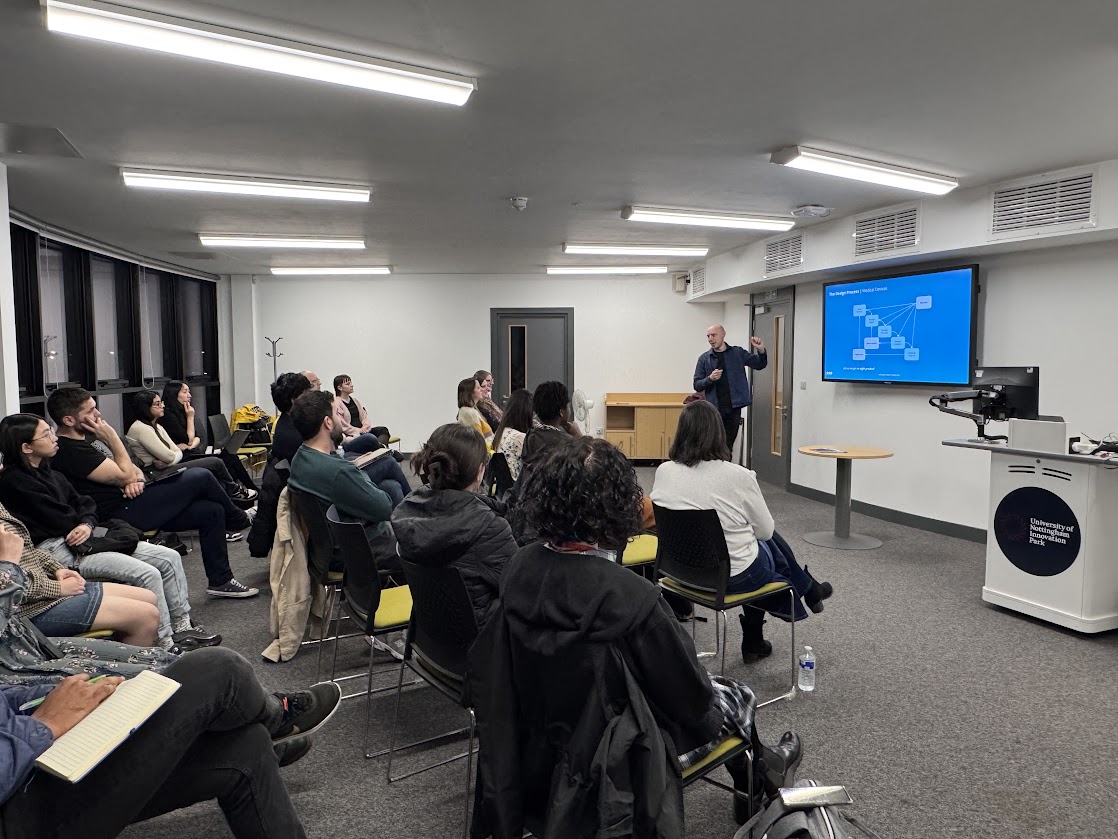 speaker Matt Langford presents his talk to audience at ding meetup