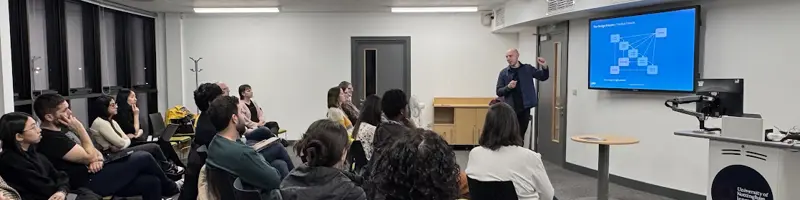 speaker Matt Langford presents his talk to audience at ding meetup