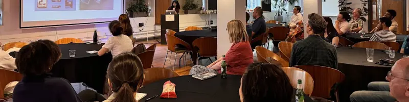 speaker tanvi vats presents her talk to ding audience